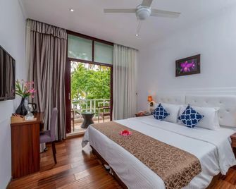 Sun Tan Beach Hotel - Maafushi - Habitación