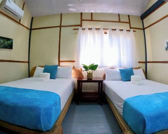 Charming 2-bedroom apartment in enchanting Punta Rucia with AC, WiFi - Villa Isabela - Habitación