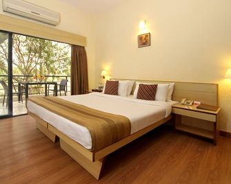 Hotel Phoenix Koregaon Park - פון - חדר שינה