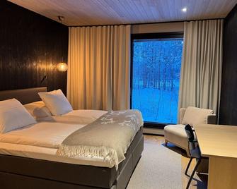 Wilderness Hotel Juutua - Inari - Schlafzimmer