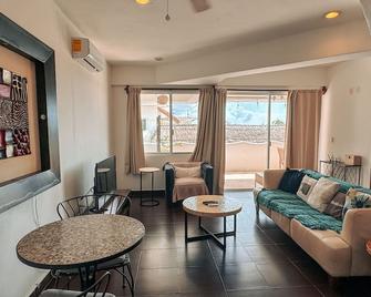 Luxury Beach Condo with views of Caribbean Sea in heart of Mahahual - Costa Maya - Majahual - Living room