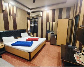 Hotel Vilas - Аллахабад - Спальня