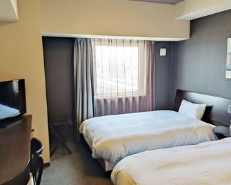 Hotel Route-Inn Gifuhashima Ekimae - Hashima - Slaapkamer