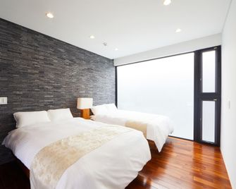 E-Horizon Resort Premium Sesoko B - Motobu - Schlafzimmer