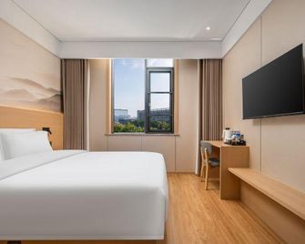 Meile Hotel - Shiyan - Camera da letto