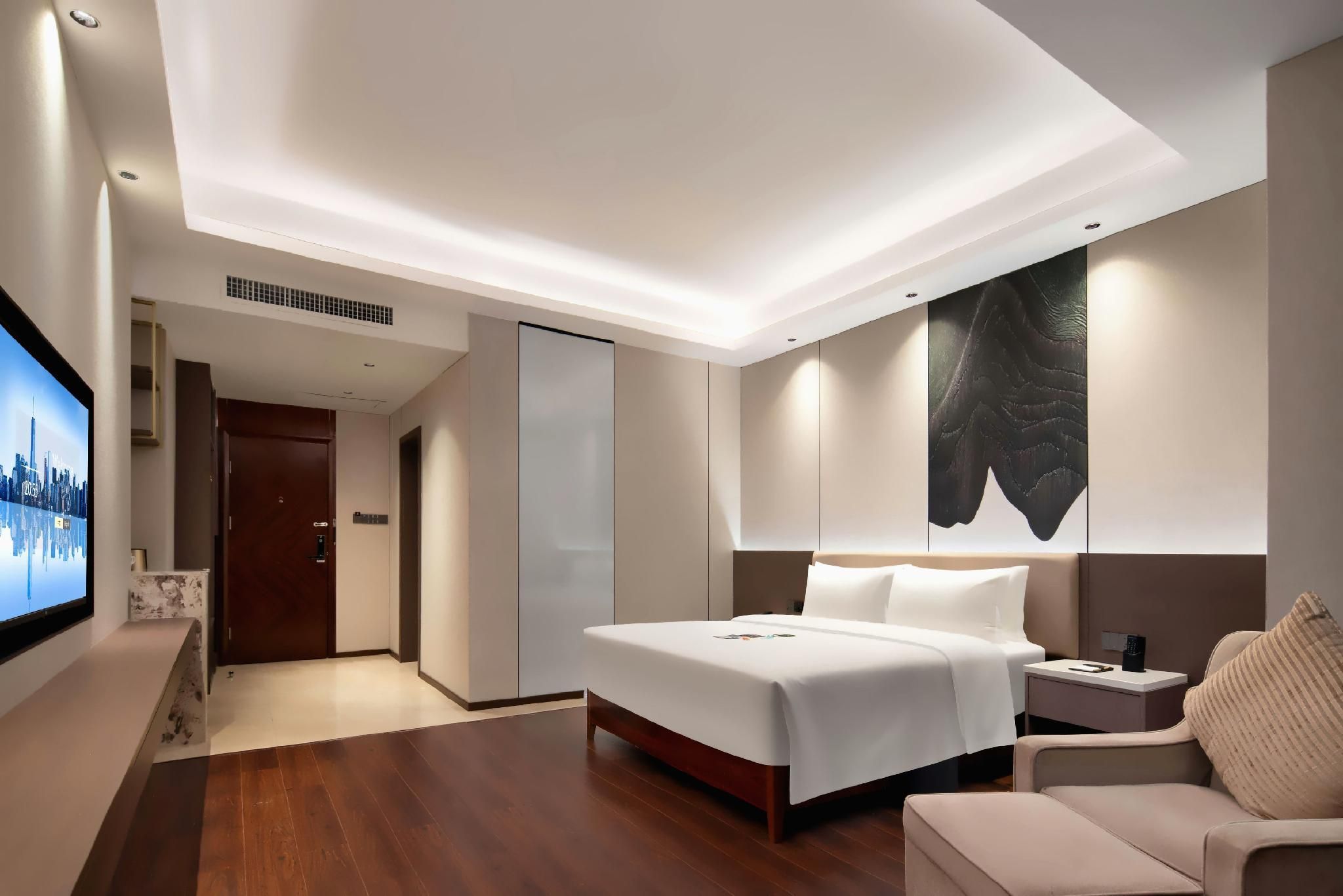 Meijun International Hotel - צ'נגשה - חדר שינה