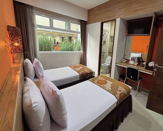 Hotel Bumi Makmur Indah - Lembang - Slaapkamer
