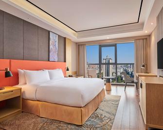 Hilton Garden Inn Wuhan Hankou - Wuhan - Bedroom