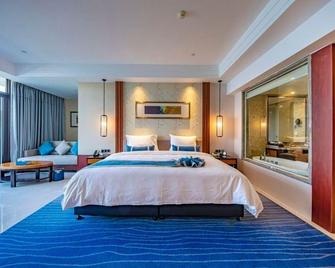 Nishi Haitai Junting Hotel - Weihai - Soveværelse