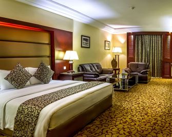 Days Inn by Wyndham Hotel Suites Amman - עמאן - חדר שינה