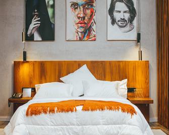 بوروندي بالاس بوتيك هوتل - بوجومبورا - غرفة نوم