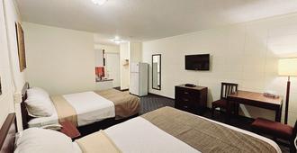 Canadian Motor Inn - Grande Prairie - Schlafzimmer