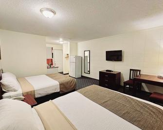 Canadian Motor Inn - Grande Prairie - Bedroom