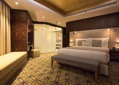 Grand Millennium Muscat - Muscat - Bedroom