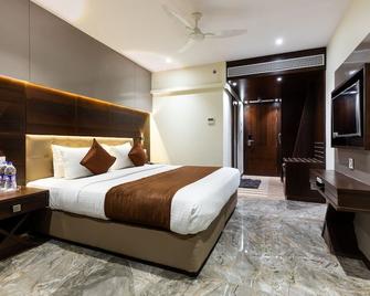 Hotel President, Pure Veg - Indore - Bedroom