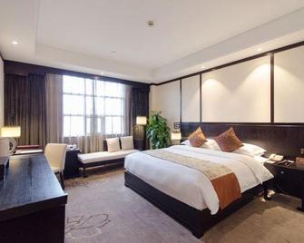 Hancity Grand Hotel - Xiangyang - Schlafzimmer
