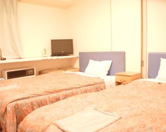 Business Hotel Chateau Est Takamatsu - Takamatsu - Bedroom