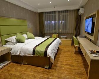 Dongtai Dashijie Hotel - Dandong - Slaapkamer