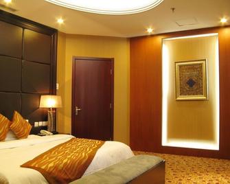 Bijie Business Hotel - Beijing - Bedroom