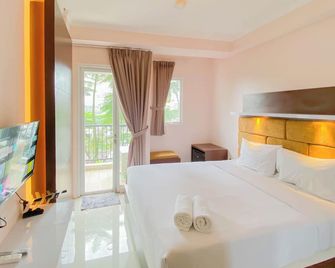 Well Design and Homey Studio Signature Park Grande Apartment By Travelio - Jakarta - Bedroom