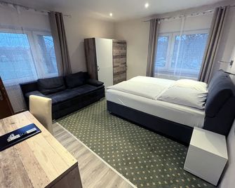 هوتل أكواريوس - براونشويغ - غرفة نوم