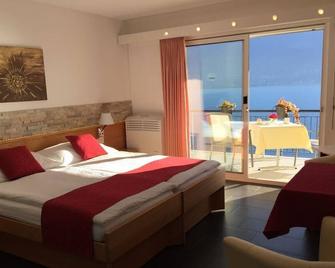 Hotel Garni Morettina - Brissago - Bedroom