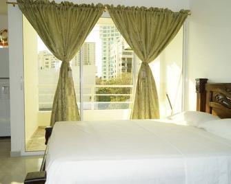 أبارتاهوتل توكاسا روداديرو - بلدية سانتا مارتا - غرفة نوم