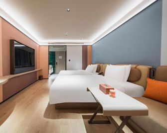 Orange Hotel Linzhi Yak Square - Ньїнгчі - Спальня