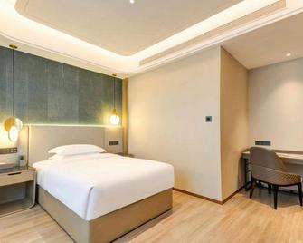 Feeling Hotel - Yulin - Bedroom