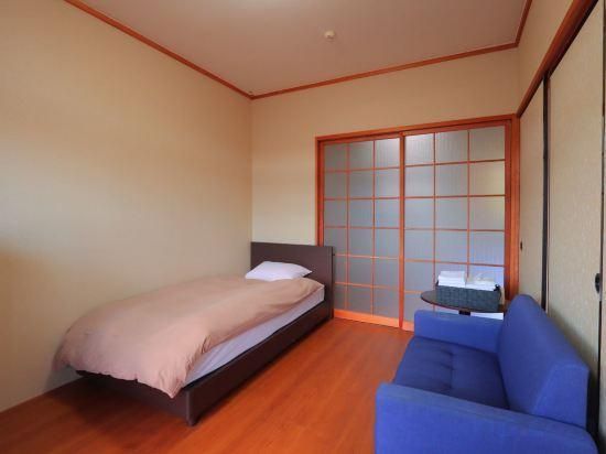 Business Hotel Rich - Nichinan - Camera da letto