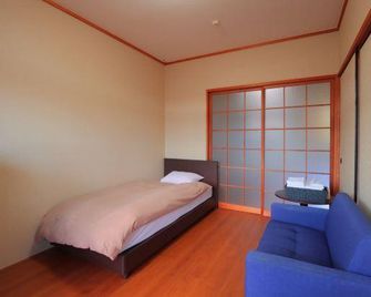 Business Hotel Rich - Nichinan - Camera da letto