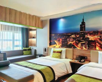 Nanjing South Railway Station Licheng Ali Hotel - Nanjing - Bedroom