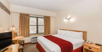 Travelodge Inn & Suites by Wyndham Deadwood - דדווד - חדר שינה