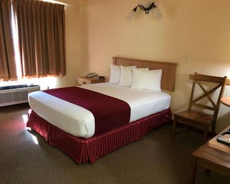 Travelodge Inn & Suites by Wyndham Deadwood - Deadwood - Bedroom