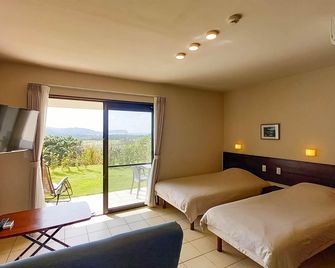 Terrace Iriomotejima Condominium - Taketomi - Schlafzimmer