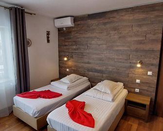 Pensiunea Riunione - Braşov - Bedroom