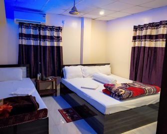 Deteex Hotel Baluchar - Mandarmani - Slaapkamer