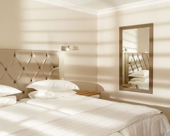 Loerie Guest Lodge - ג'ורג' - חדר שינה