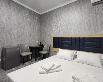 Room4you - Taškent - Makuuhuone