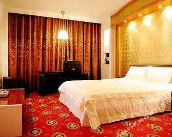 Nanyang Wangfu Hotel (Fuxuan) - Nanyang - Bedroom