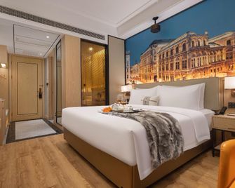 Vienna International Hotel - Huanggang - Bedroom