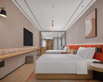 Hilton Garden Inn Chengdu Chunxi Road Center - Chengdu - Bedroom