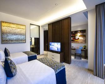 Amaryllis Boutique Resort - Puncak - Schlafzimmer