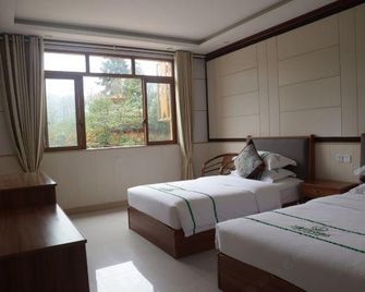 Southern Sichuan Bamboo Sea Colorfulsunshin · Wanshunhao Hotel - Yibin - Slaapkamer