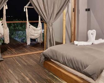 Restaurant And Villas - Bira - Sypialnia