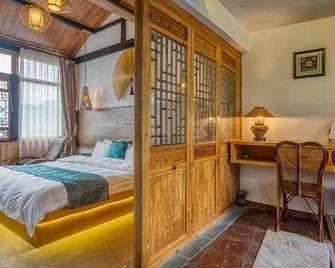 Heshun Xinyue Boutique Inn - Baoshan - Bedroom