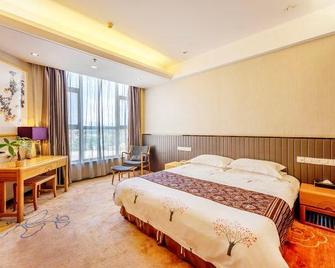 Qianxi Yihe Hotel - Linyi - Slaapkamer