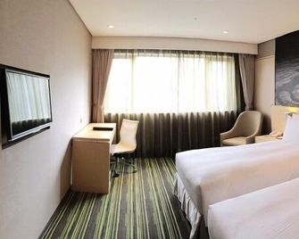 Tao Garden Hotel - Taoyuan City - Schlafzimmer