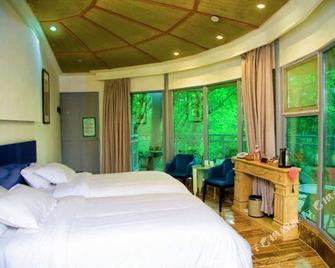 Yinxin'gu Treehouse Hotel - Lishui - Спальня