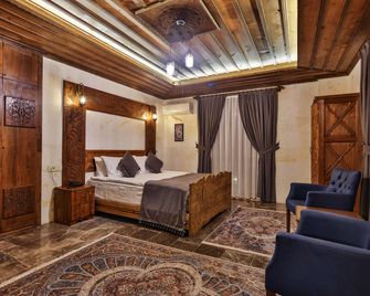 Garden Suites Hotel Cappadocia - Goreme - Makuuhuone